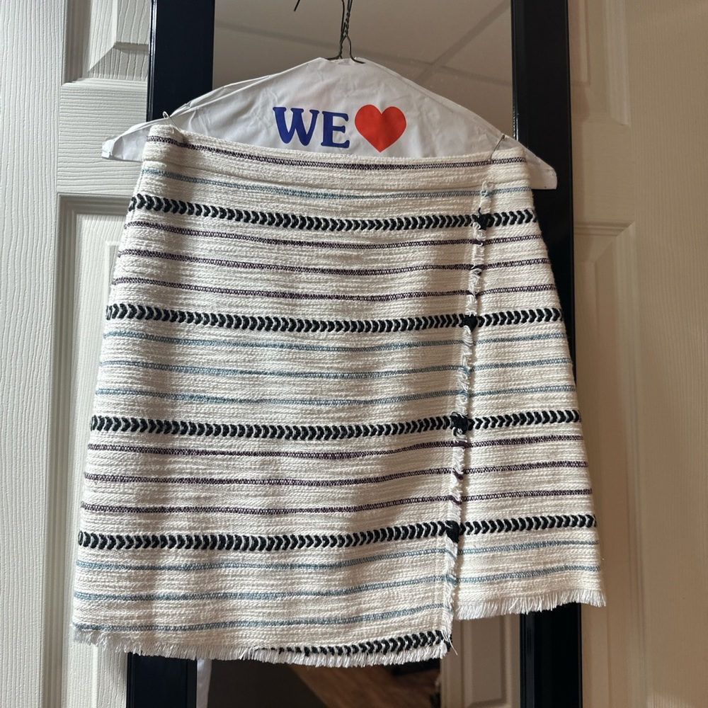 Cream and multicolored striped skirt with wrap styled slant on bias